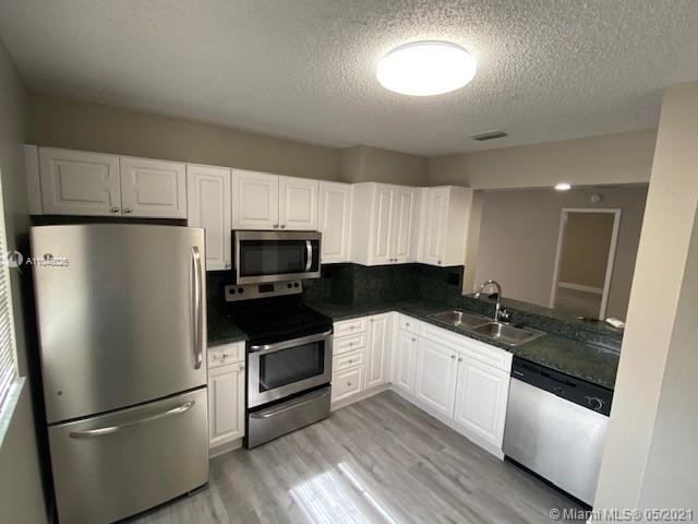 Building Photo - 12155 Royal Palm Blvd