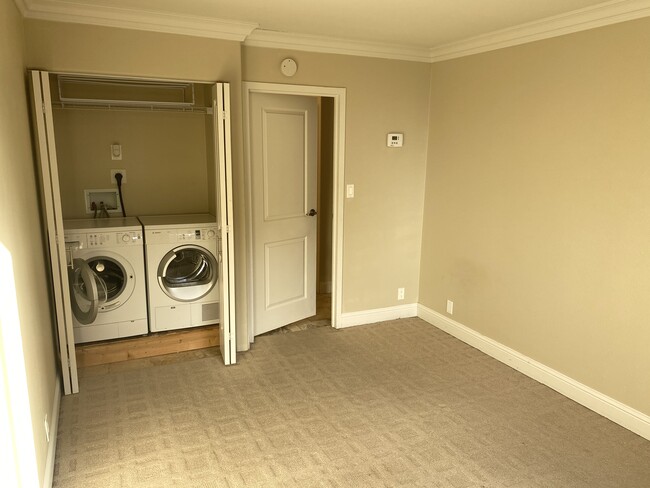 Unit Bedroom with Washer/Dryer - 700 E 8th St