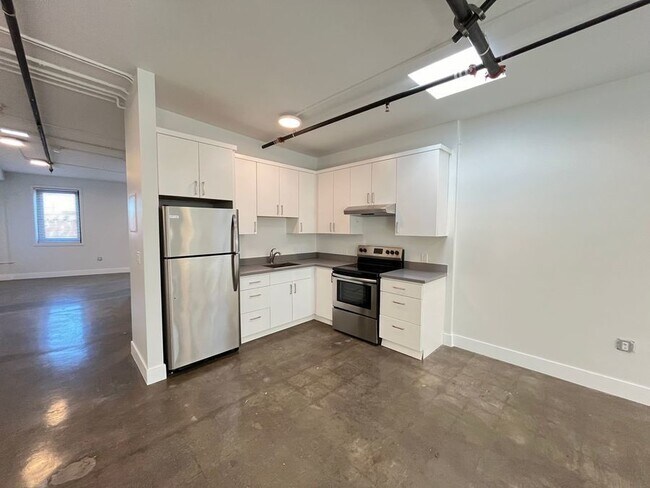 Building Photo - Modern space in historic building. Two mon...