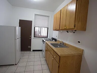 Building Photo - 5416 S Woodlawn Ave