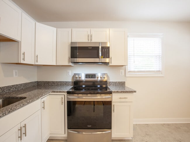 Smooth top range with microwave above - 612 Rock Creek Road