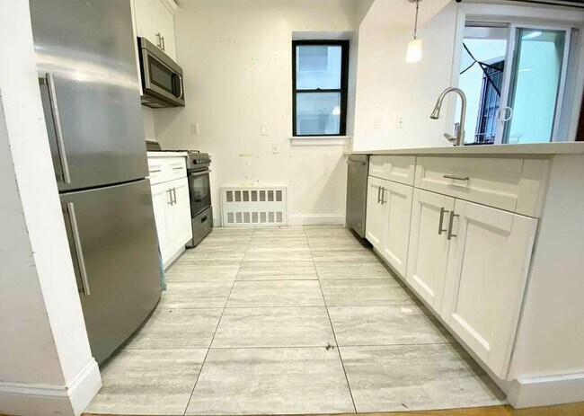 Foto del edificio - 3 W 137th St
