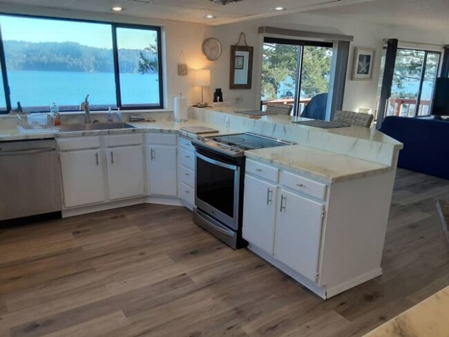 Building Photo - The expansive Hood Canal View is at your f...