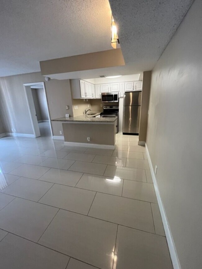 Building Photo - TWO BEDROOM TWO BATHROOM! WATERFRONT COMMU...
