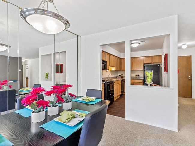 Cozy Dining Room and Kitchen at Franklin River Apartments in Southfield, MI - Franklin River Apartments