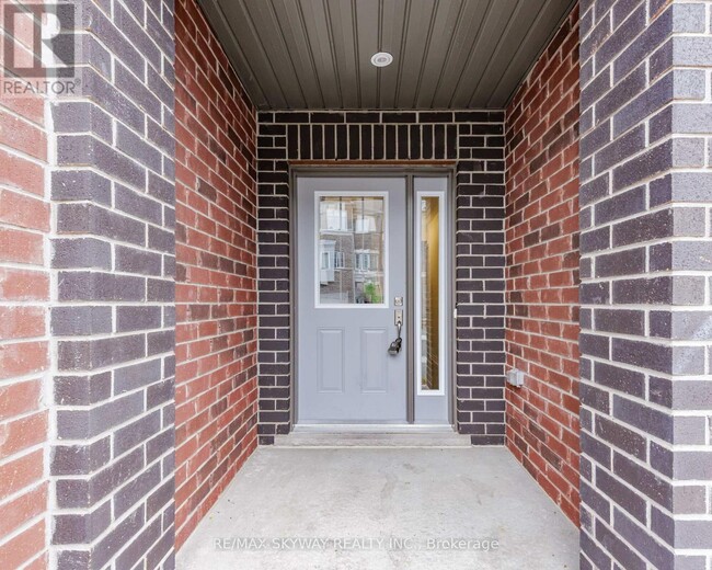 Photo du bâtiment - 311-311 Woolwich St