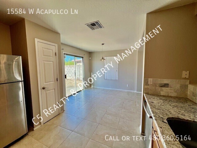 Building Photo - 15584 W Acapulco Ln