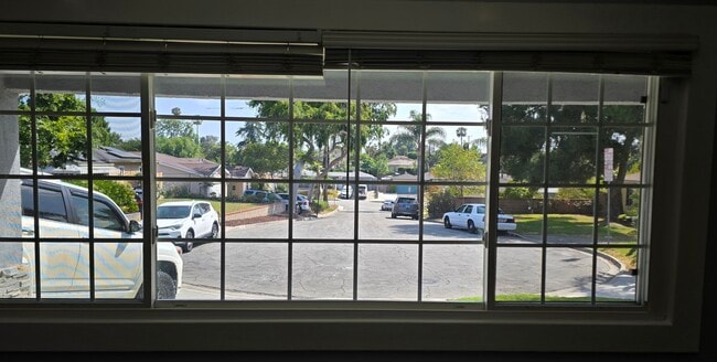 Living room view of cul-de-sac - 10603 Bramblebush Ave