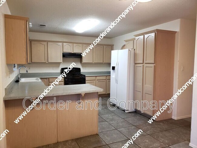 Foto del edificio - 5547 Rabadi Castle Ave NW