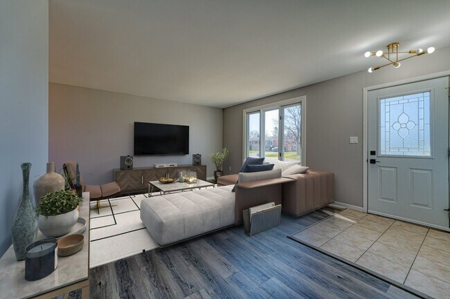 Photo du bâtiment - Bright & Spacious 3 Bedroom Main Floor Uni...