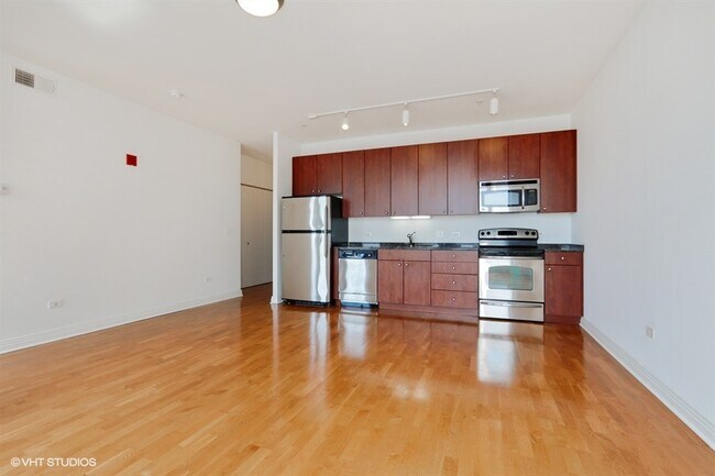 Foto del edificio - 565 W Quincy St