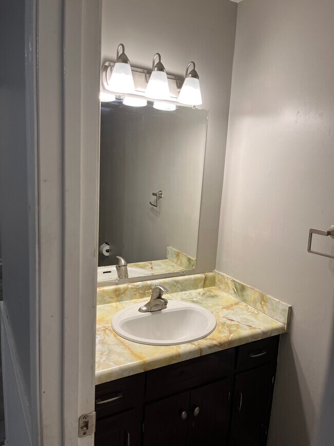 Half bath downstairs - 263 Robin Ln NW