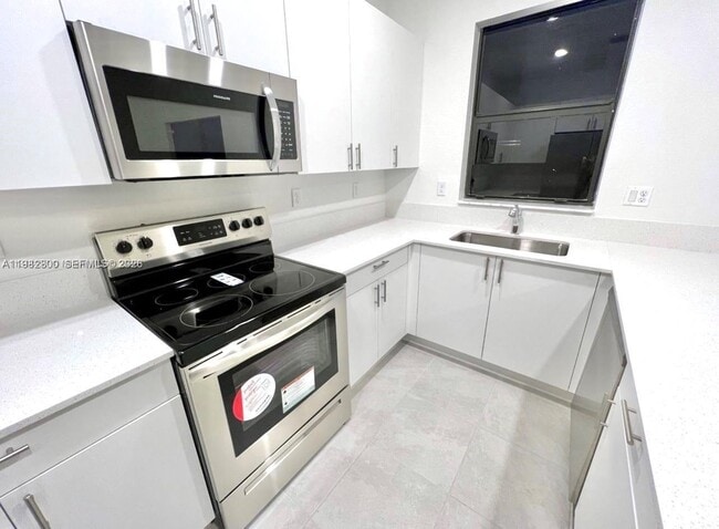 Photo - 12950 Southwest 233rd Terrace, Princeton, FL 33032 - 3 BR 2.5 BA townhouse