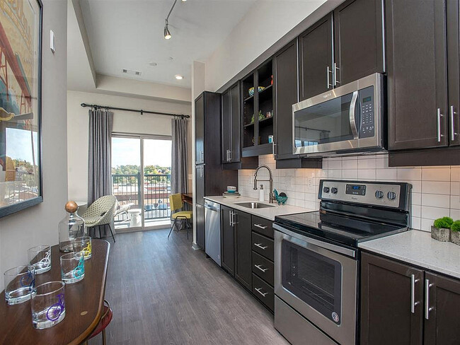 Step into a modern kitchen designed for the urban lifestyle, where style meets functionality. - Eastside Heights