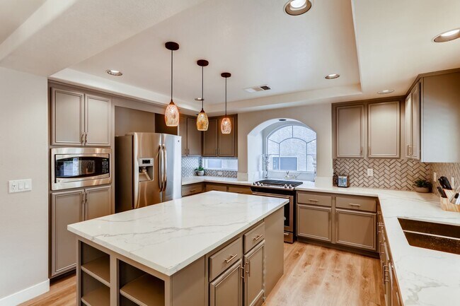 Building Photo - Modern 5-Bedroom, 3-Bathroom Oasis with a 3-Car Garage in the Heart of Las Vegas