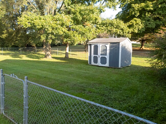 Back yard and storage building - 7241 Evanel Way