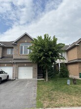 Building Photo - 108 Talltree Crescent