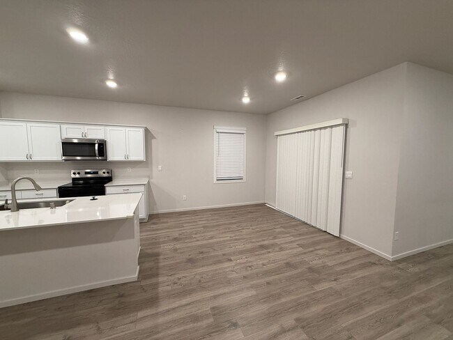 Building Photo - New Construction 4 Bed Mead School District Rancher w/ Fully-Fenced Yard and Attached Garage!