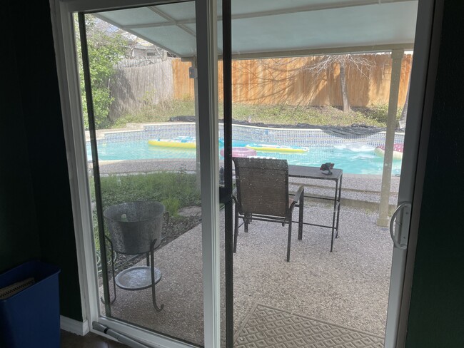 Sliding door from kitchen into backyard - 7251 Sunlit Trail Dr