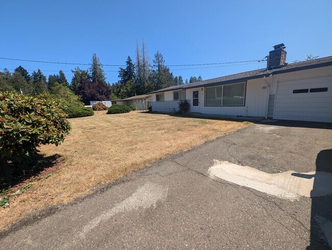 Building Photo - Rambler with large yard and storage shed...