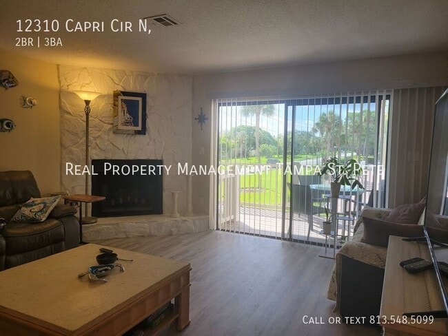Building Photo - 12310 Capri Cir N