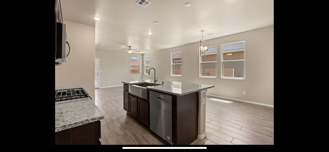 Model pic; actual kitchen flipped. - 2818 Cambridge Ave NE