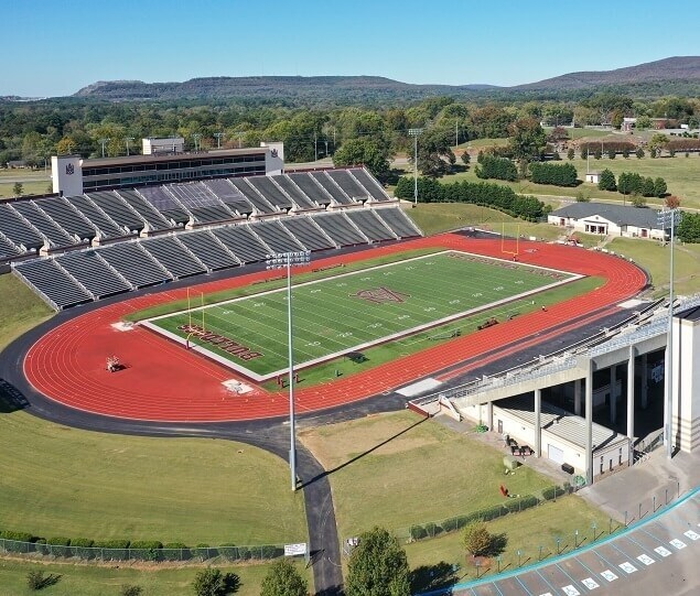 Cheer on the Bulldogs football team at Louis Crews Stadium