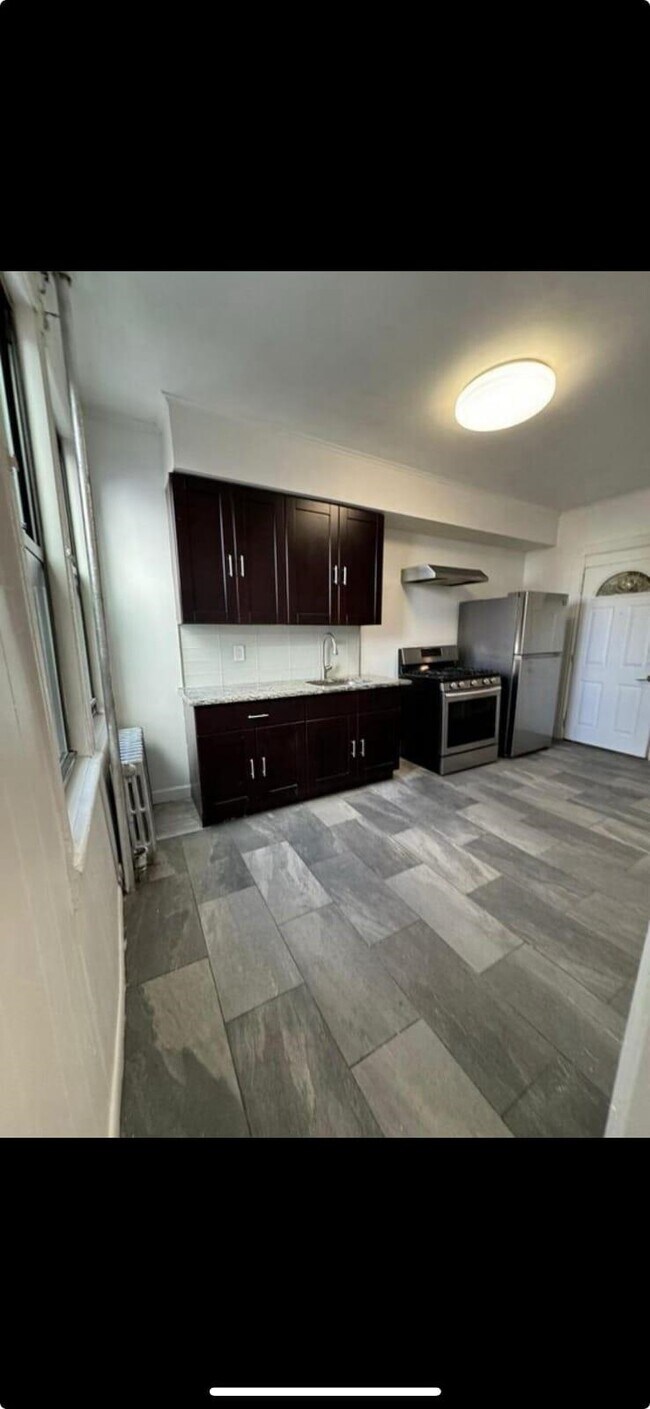 Building Photo - 6099-6001 Hudson Ave