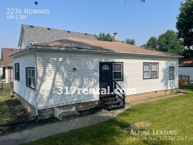 Primary Photo - 4/2 with garage/workshop combo (has workin...