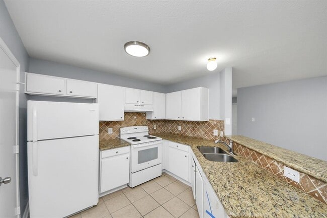 Foto del edificio - 10405 Shadow Oaks Dr