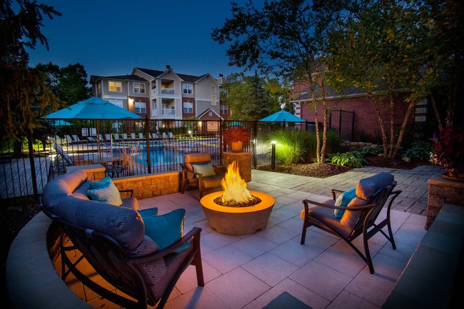 Outdoor fire pit and lounge seating - Lake Clearwater Apartments