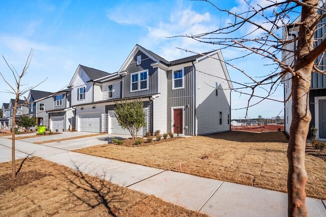 Building Photo - BRAND-NEW TOWNHOME-PRICE REDUCED!  Close t...