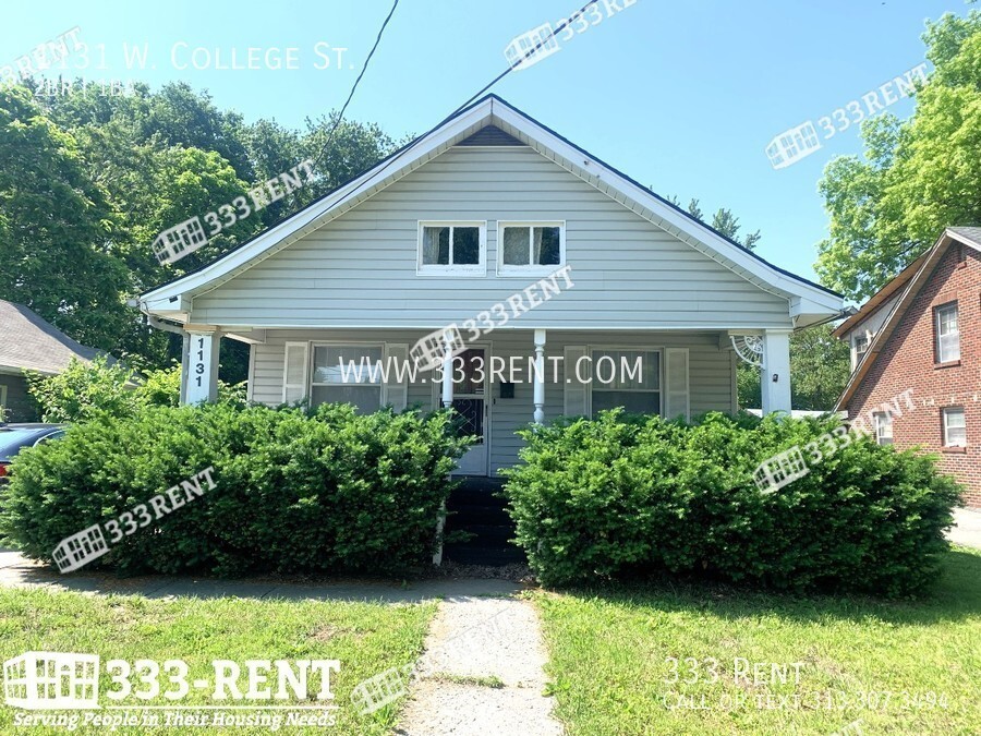 Primary Photo - Storage! Full basement and detached garage!