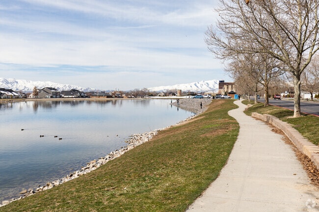 The walking path at Manila Creek Park follows the water, providing a peaceful place to exercise.
