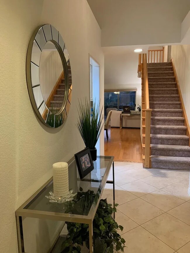 Entry way from front door. Stairs leading to 3rd. bedroom and .5 bathroom - 24609 Calle Ardilla