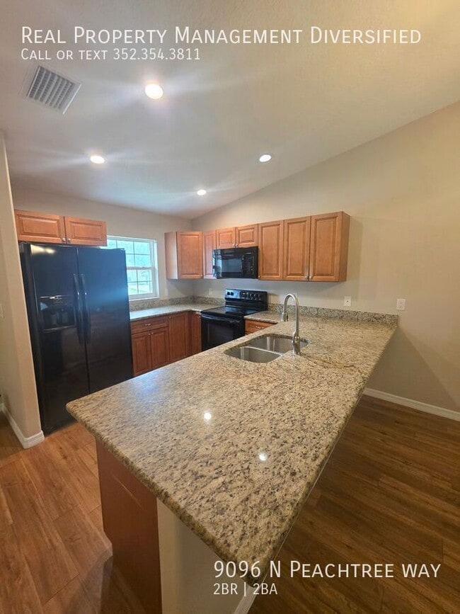 Building Photo - 9096 N Peachtree Way