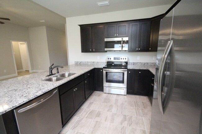 Building Photo - Brick home, 3 bed 2 bath ~ covered porch a...