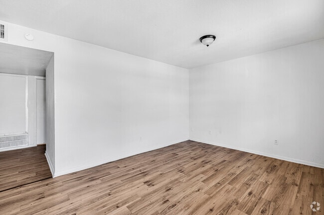 3BR, 1BA - 650SF - Living - Move-In Special | Affordable Angleton Apts