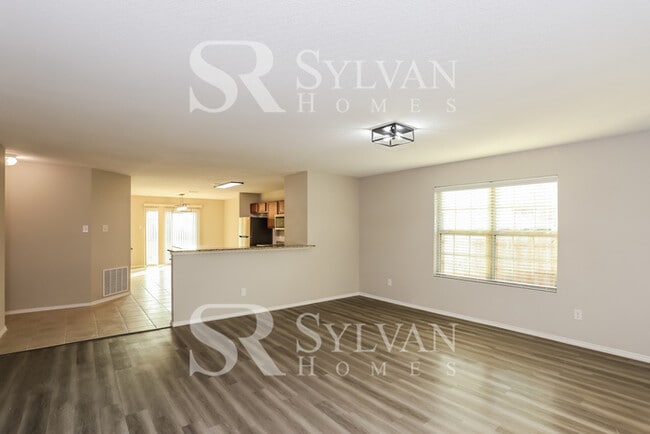 Building Photo - Fall in love with this beautifully maintained 4BR 2BA brick home