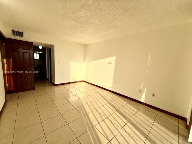 Building Photo - 4675 W 18th Ct