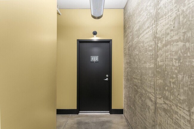 Building Photo - McKenzie Lofts - 4th floor south facing studio w/parking/storage/covered balcony