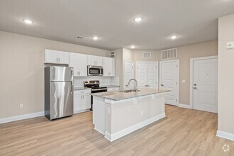 The Cove: 3BR, 2BA - Kitchen - Flats at East Bay