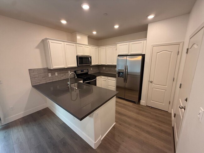 Building Photo - 2 bed | 2.5 bath | 1302 SF | 1 Car Garage | Two Story | Tenant pays $175 monthly for WS&G