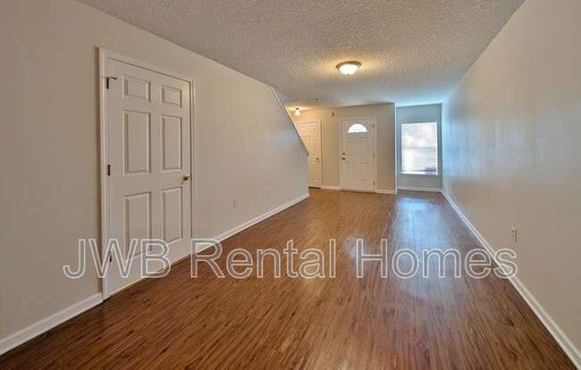 Building Photo - 8402 McGirts Village Ln