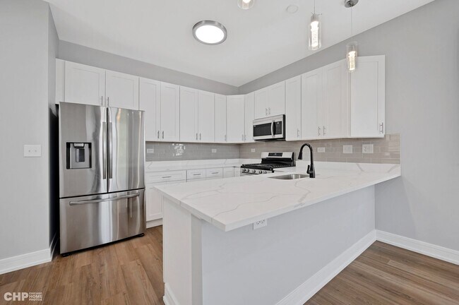 Foto del edificio - 4157 S Prairie Ave