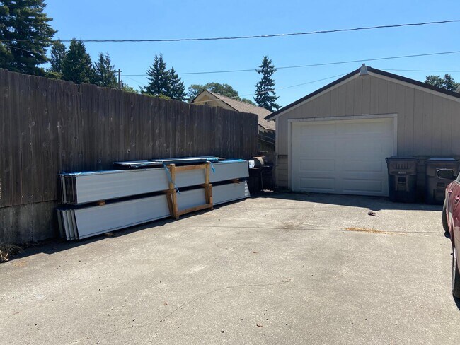 Parking (2021) can fit two cars on cement easily and plenty of parking along the way - 10601 Broadway Ave S