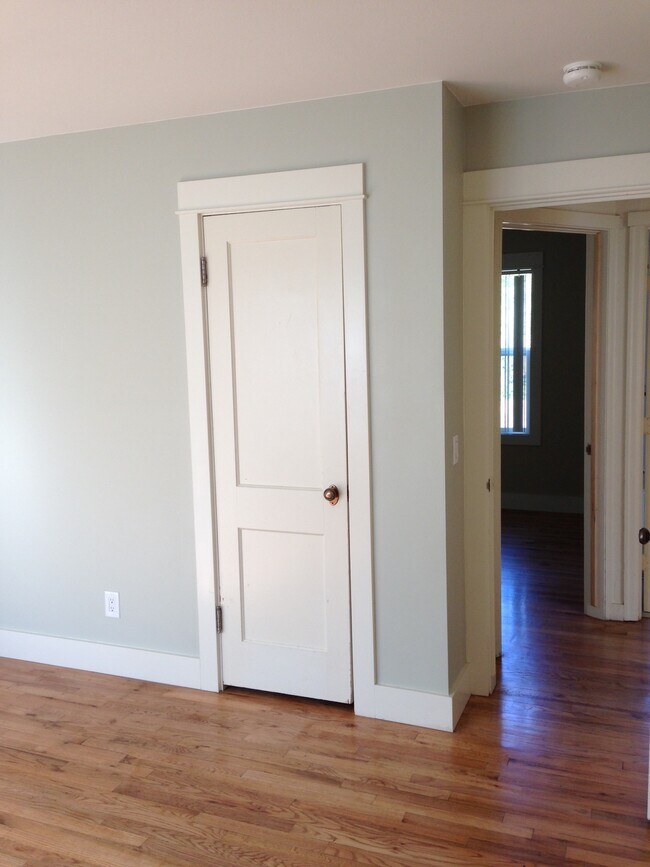 Bedroom 1: Light and bright, hardwoods, ground floor - 4844 NE Rodney Ave.