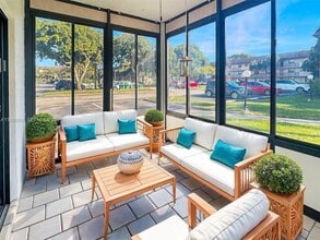 Building Photo - 6090 N Sabal Palm Blvd