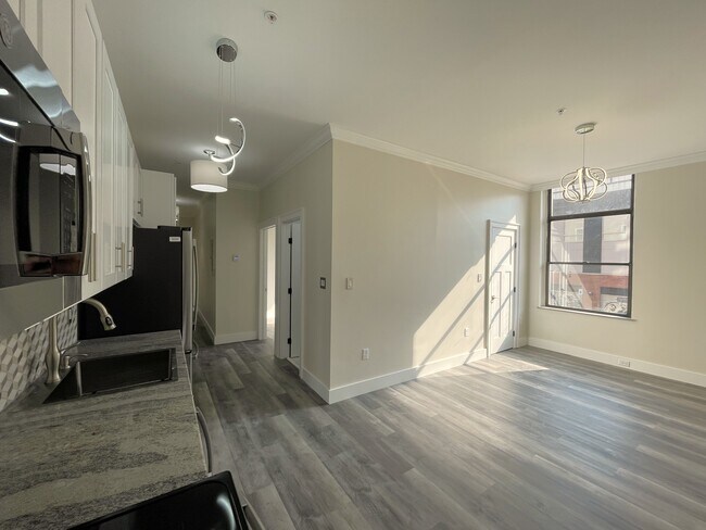 Cocina y sala de estar del apartamento - Mark Twain Building