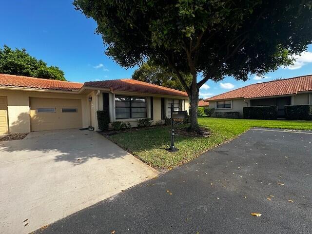 Building Photo - 9930 Frangipani Tree Way